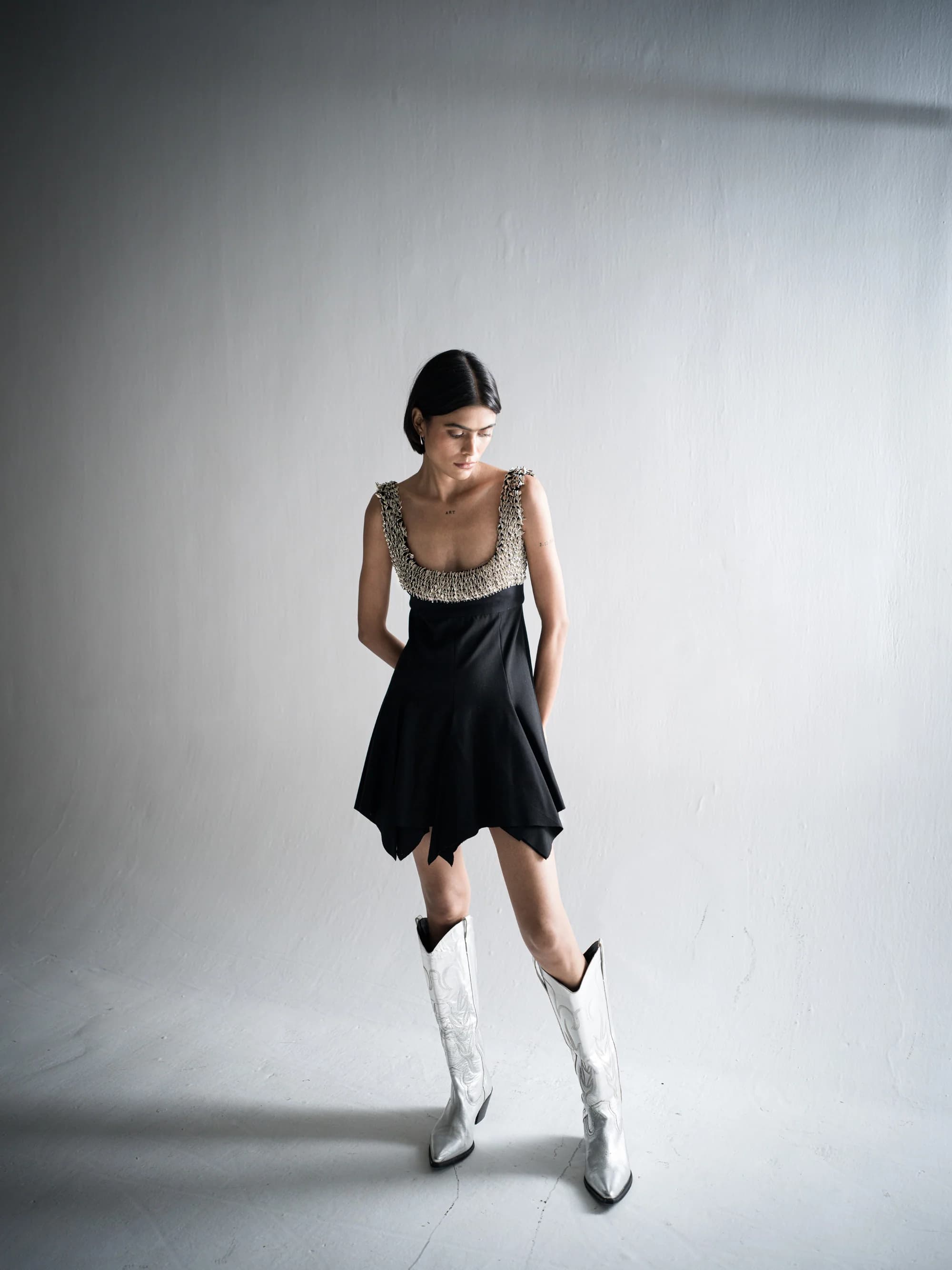 GRAINE hand embellished metal work detail